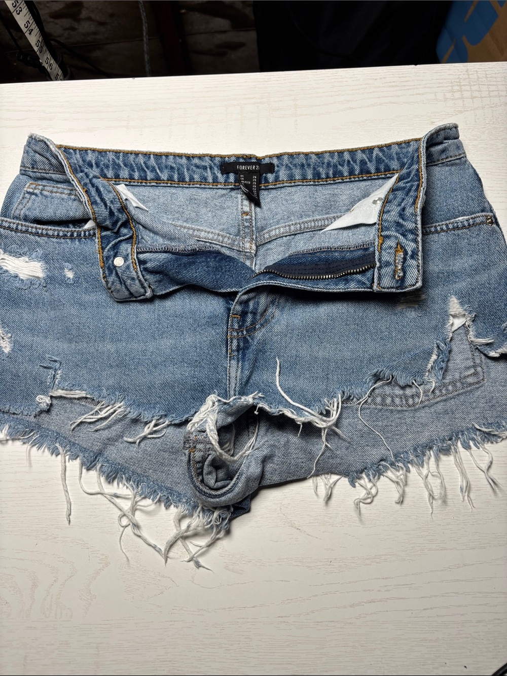 Forever 21 Light Wash Distressed Denim Cutoff Shorts